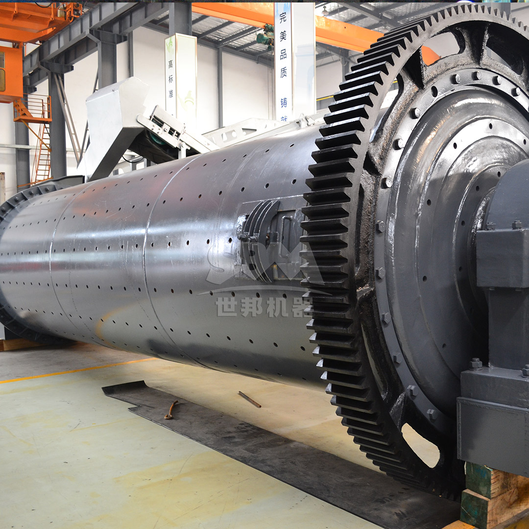 A large industrial ball mill used for coarse grinding of calcium carbonate